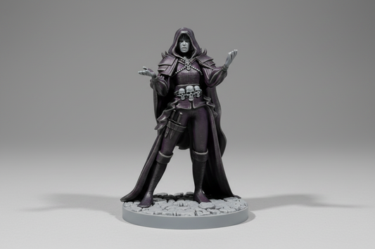 Dark fantasy figurine with a hooded cloak on a gray background
